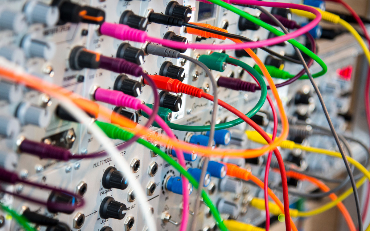 PostgreSQL EXPLAIN ANALYZE is represented by tangled cables