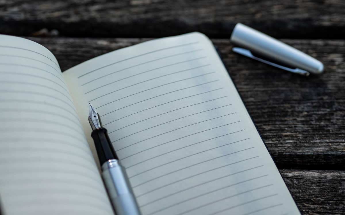 PostgreSQL performance checklist is represented by a notebook